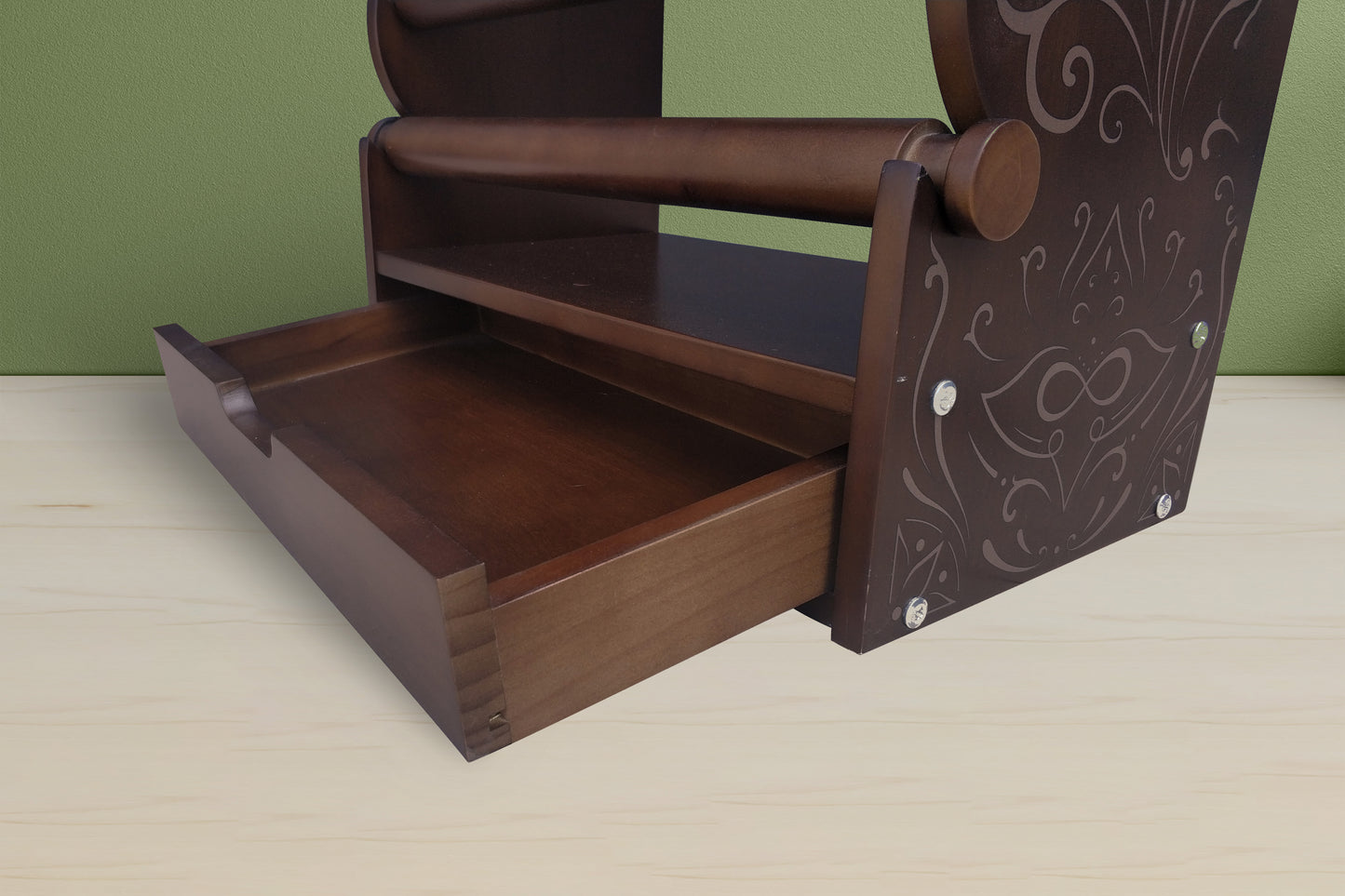 Professional dark wood bracelet organizer with a unique engraved side panel design and removable rods
