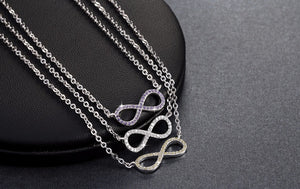 Silver Infinity Symbol Necklace with Yellow Zircon Crystals