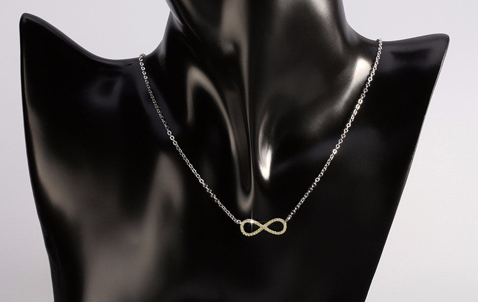Silver Infinity Symbol Necklace with Yellow Zircon Crystals